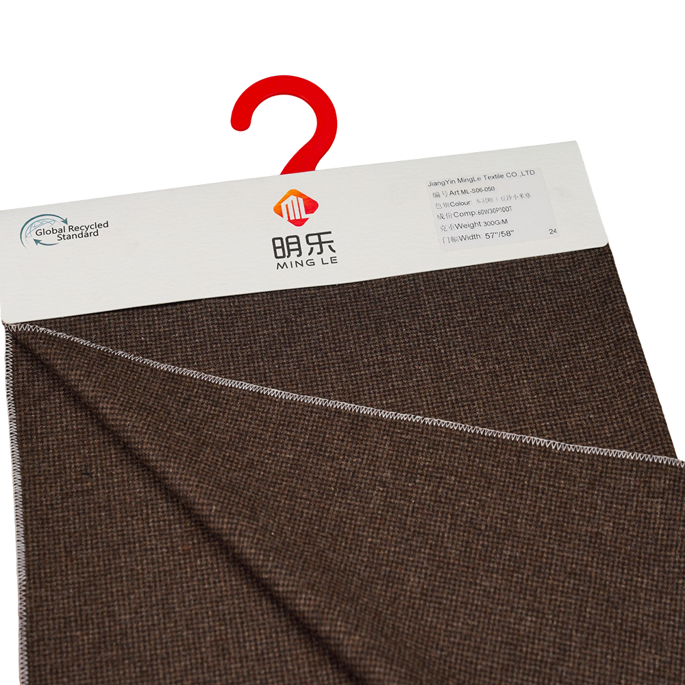 60 % villaa, 30 % polyesteriä, 10 % muuta kuitua, 300 G/M, sekoitettu kahvi + punapapupasta, hirssi, flanellikangas, ML-S06-050